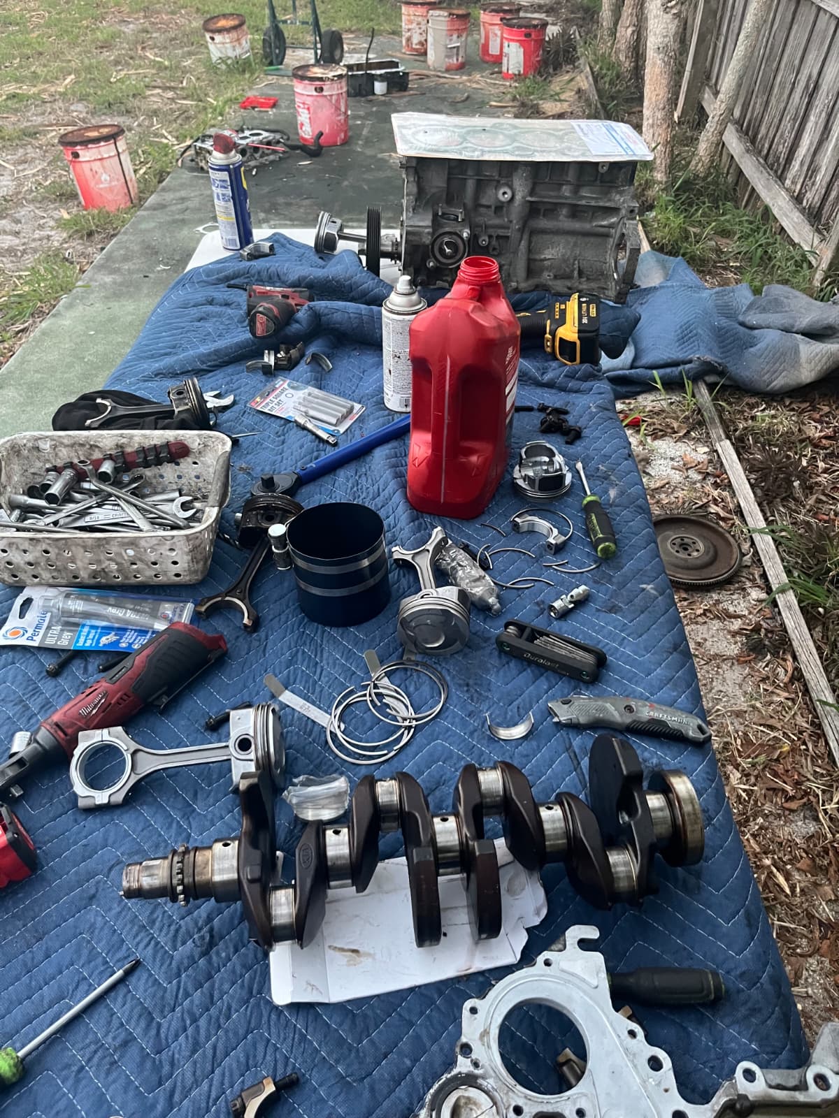 Engine internals — crankshaft and pistons laid out